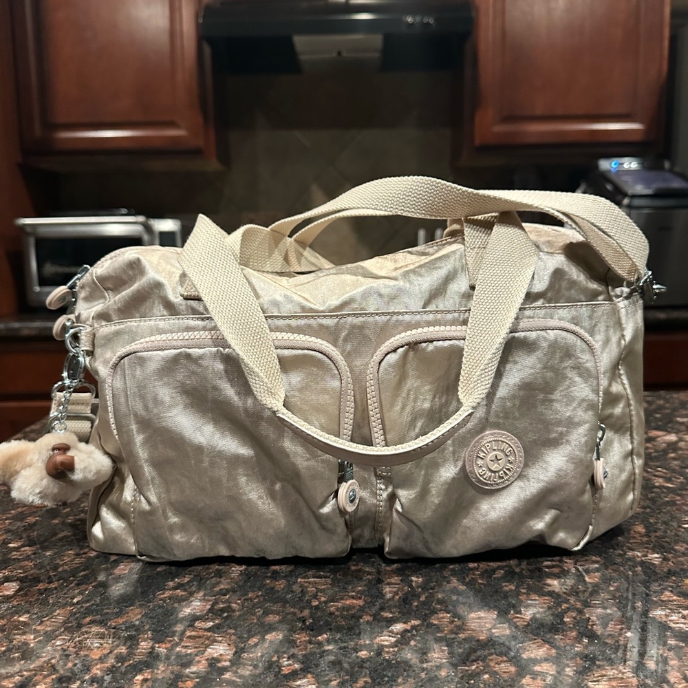 Kipling Cream Metallic Small Weekender Bag with Monkey Charm